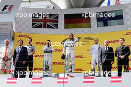 The podium (L to R): Nico Rosberg (GER) Mercedes AMG F1, second; Lewis Hamilton (GBR) Mercedes AMG F1, race winner; Daniel Ricciardo (AUS) Red Bull Racing, third. 22.06.2014. Formula 1 World Championship, Rd 8, Austrian Grand Prix, Spielberg, Austria, Race Day.