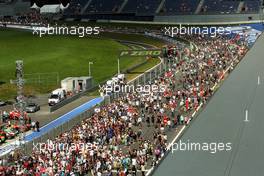 Fans invade the circuit after the race. 22.06.2014. Formula 1 World Championship, Rd 8, Austrian Grand Prix, Spielberg, Austria, Race Day.