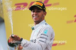 Lewis Hamilton (GBR) Mercedes AMG F1 celebrates his second position on the podium. 22.06.2014. Formula 1 World Championship, Rd 8, Austrian Grand Prix, Spielberg, Austria, Race Day.