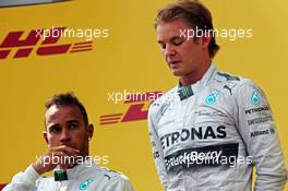 The podium (L to R): second placed Lewis Hamilton (GBR) Mercedes AMG F1 with team mate and race winner Nico Rosberg (GER) Mercedes AMG F1. 22.06.2014. Formula 1 World Championship, Rd 8, Austrian Grand Prix, Spielberg, Austria, Race Day.