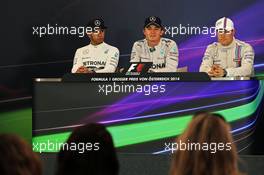 The post race FIA Press Conference (L to R): Nico Rosberg (GER) Mercedes AMG F1, second; Lewis Hamilton (GBR) Mercedes AMG F1, race winner; Daniel Ricciardo (AUS) Red Bull Racing, third. 22.06.2014. Formula 1 World Championship, Rd 8, Austrian Grand Prix, Spielberg, Austria, Race Day.