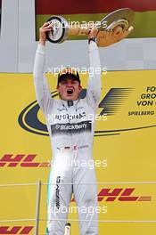 Race winner Nico Rosberg (GER) Mercedes AMG F1 celebrates on the podium. 22.06.2014. Formula 1 World Championship, Rd 8, Austrian Grand Prix, Spielberg, Austria, Race Day.