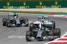 Nico Rosberg (GER) Mercedes AMG F1 W05 leads Valtteri Bottas (FIN) Williams FW36 and Lewis Hamilton (GBR) Mercedes AMG F1 W05. 22.06.2014. Formula 1 World Championship, Rd 8, Austrian Grand Prix, Spielberg, Austria, Race Day.