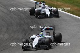 Felipe Massa (BRA) Williams FW36 leads team mate Valtteri Bottas (FIN) Williams FW36. 22.06.2014. Formula 1 World Championship, Rd 8, Austrian Grand Prix, Spielberg, Austria, Race Day.