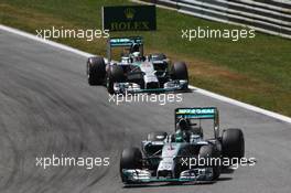 Nico Rosberg (GER) Mercedes AMG F1 W05 leads team mate Lewis Hamilton (GBR) Mercedes AMG F1 W05. 22.06.2014. Formula 1 World Championship, Rd 8, Austrian Grand Prix, Spielberg, Austria, Race Day.