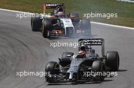 Kevin Magnussen (DEN) McLaren MP4-29 locks up under braking. 22.06.2014. Formula 1 World Championship, Rd 8, Austrian Grand Prix, Spielberg, Austria, Race Day.