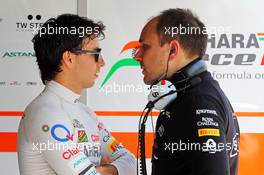 Sergio Perez (MEX) Sahara Force India F1 with Gianpiero Lambiase (ITA) Sahara Force India F1 Engineer. 22.06.2014. Formula 1 World Championship, Rd 8, Austrian Grand Prix, Spielberg, Austria, Race Day.