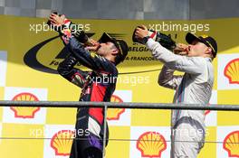 (L to R): Race winner Daniel Ricciardo (AUS) Red Bull Racing celebrates with third placed Valtteri Bottas (FIN) Williams. 24.08.2014. Formula 1 World Championship, Rd 12, Belgian Grand Prix, Spa Francorchamps, Belgium, Race Day.