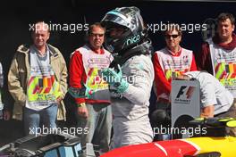 Nico Rosberg (GER) Mercedes AMG F1 in parc ferme. 24.08.2014. Formula 1 World Championship, Rd 12, Belgian Grand Prix, Spa Francorchamps, Belgium, Race Day.
