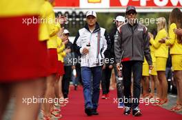 (L to R): Valtteri Bottas (FIN) Williams and Esteban Gutierrez (MEX) Sauber on the drivers parade. 24.08.2014. Formula 1 World Championship, Rd 12, Belgian Grand Prix, Spa Francorchamps, Belgium, Race Day.