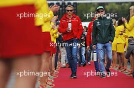(L to R): Max Chilton (GBR) Marussia F1 Team and Marcus Ericsson (SWE) Caterham on the drivers parade. 24.08.2014. Formula 1 World Championship, Rd 12, Belgian Grand Prix, Spa Francorchamps, Belgium, Race Day.