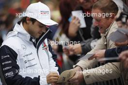 Felipe Massa (BRA) Williams signs autographs for the fans. 21.08.2014. Formula 1 World Championship, Rd 12, Belgian Grand Prix, Spa Francorchamps, Belgium, Preparation Day.