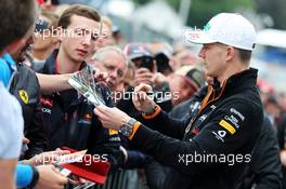 Nico Hulkenberg (GER) Sahara Force India F1 signs autographs for the fans. 21.08.2014. Formula 1 World Championship, Rd 12, Belgian Grand Prix, Spa Francorchamps, Belgium, Preparation Day.