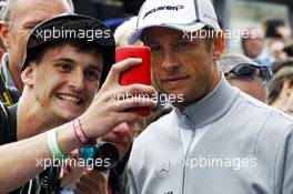 Jenson Button (GBR) McLaren with fans. 21.08.2014. Formula 1 World Championship, Rd 12, Belgian Grand Prix, Spa Francorchamps, Belgium, Preparation Day.