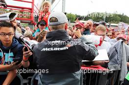 Kevin Magnussen (DEN) McLaren signs autographs for the fans. 21.08.2014. Formula 1 World Championship, Rd 12, Belgian Grand Prix, Spa Francorchamps, Belgium, Preparation Day.