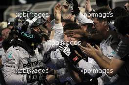 Second placed Nico Rosberg (GER) Mercedes AMG F1 celebrates with the team in parc ferme. 06.04.2014. Formula 1 World Championship, Rd 3, Bahrain Grand Prix, Sakhir, Bahrain, Race Day.