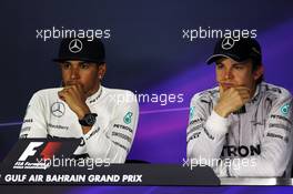 (L to R): Lewis Hamilton (GBR) Mercedes AMG F1 with Nico Rosberg (GER) Mercedes AMG F1 in the FIA Press Conference. 06.04.2014. Formula 1 World Championship, Rd 3, Bahrain Grand Prix, Sakhir, Bahrain, Race Day.