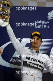 Nico Rosberg (GER) Mercedes AMG F1 celebrates his second position on the podium. 06.04.2014. Formula 1 World Championship, Rd 3, Bahrain Grand Prix, Sakhir, Bahrain, Race Day.
