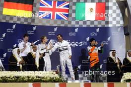 The podium (L to R): Nico Rosberg (GER) Mercedes AMG F1, second; Lewis Hamilton (GBR) Mercedes AMG F1, race winner; Sergio Perez (MEX) Sahara Force India F1, third. 06.04.2014. Formula 1 World Championship, Rd 3, Bahrain Grand Prix, Sakhir, Bahrain, Race Day.