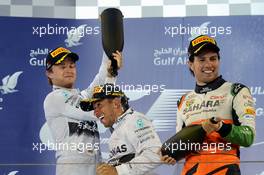 The podium (L to R): Nico Rosberg (GER) Mercedes AMG F1, second; Lewis Hamilton (GBR) Mercedes AMG F1, race winner; Sergio Perez (MEX) Sahara Force India F1, third. 06.04.2014. Formula 1 World Championship, Rd 3, Bahrain Grand Prix, Sakhir, Bahrain, Race Day.