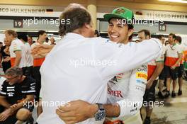 Sergio Perez (MEX) Sahara Force India F1 celebrates his third position with Robert Fernley (GBR) Sahara Force India F1 Team Deputy Team Principal and the team. 06.04.2014. Formula 1 World Championship, Rd 3, Bahrain Grand Prix, Sakhir, Bahrain, Race Day.