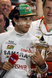 Sergio Perez (MEX) Sahara Force India F1 celebrates his third position with the team. 06.04.2014. Formula 1 World Championship, Rd 3, Bahrain Grand Prix, Sakhir, Bahrain, Race Day.