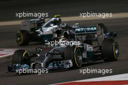 Lewis Hamilton (GBR) Mercedes AMG F1 W05 leads Nico Rosberg (GER) Mercedes AMG F1 W05. 06.04.2014. Formula 1 World Championship, Rd 3, Bahrain Grand Prix, Sakhir, Bahrain, Race Day.