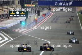 Daniel Ricciardo (AUS), Red Bull Racing and Sebastian Vettel (GER), Red Bull Racing  06.04.2014. Formula 1 World Championship, Rd 3, Bahrain Grand Prix, Sakhir, Bahrain, Race Day.