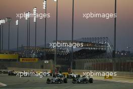 Lewis Hamilton (GBR) Mercedes AMG F1 W05 and Nico Rosberg (GER) Mercedes AMG F1 W05 at the start of the race. 06.04.2014. Formula 1 World Championship, Rd 3, Bahrain Grand Prix, Sakhir, Bahrain, Race Day.