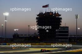 Daniil Kvyat (RUS) Scuderia Toro Rosso STR9 leads Sebastian Vettel (GER) Red Bull Racing RB10. 05.04.2014. Formula 1 World Championship, Rd 3, Bahrain Grand Prix, Sakhir, Bahrain, Qualifying Day.