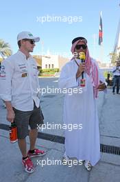 (L to R): Nico Hulkenberg (GER) Sahara Force India F1 with Kai Ebel (GER) RTL TV Presenter. 06.04.2014. Formula 1 World Championship, Rd 3, Bahrain Grand Prix, Sakhir, Bahrain, Race Day.