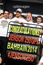 Jenson Button (GBR) McLaren celebrates his 250th GP with the team. 06.04.2014. Formula 1 World Championship, Rd 3, Bahrain Grand Prix, Sakhir, Bahrain, Race Day.