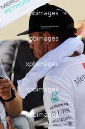 Lewis Hamilton (GBR) Mercedes AMG F1 on the grid. 09.11.2014. Formula 1 World Championship, Rd 18, Brazilian Grand Prix, Sao Paulo, Brazil, Race Day.