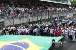 The national anthem at the grid. 09.11.2014. Formula 1 World Championship, Rd 18, Brazilian Grand Prix, Sao Paulo, Brazil, Race Day.