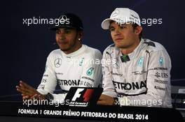(L to R): Lewis Hamilton (GBR) Mercedes AMG F1 and team mate Nico Rosberg (GER) Mercedes AMG F1 in the FIA Press Conference. 09.11.2014. Formula 1 World Championship, Rd 18, Brazilian Grand Prix, Sao Paulo, Brazil, Race Day.