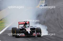 Jean-Eric Vergne (FRA) Scuderia Toro Rosso STR9 locks up under braking. 08.11.2014. Formula 1 World Championship, Rd 18, Brazilian Grand Prix, Sao Paulo, Brazil, Qualifying Day.