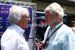 (L to R): Bernie Ecclestone (GBR) with Kevin Eason (GBR) Journalist. 09.11.2014. Formula 1 World Championship, Rd 18, Brazilian Grand Prix, Sao Paulo, Brazil, Race Day.