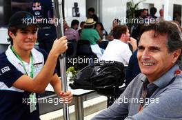 Nelson Piquet (BRA) with Pedro Piquet (BRA) Porsche GR3 Racer. 09.11.2014. Formula 1 World Championship, Rd 18, Brazilian Grand Prix, Sao Paulo, Brazil, Race Day.