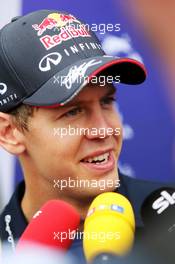 Sebastian Vettel (GER) Red Bull Racing with the media. 06.11.2014. Formula 1 World Championship, Rd 18, Brazilian Grand Prix, Sao Paulo, Brazil, Preparation Day.