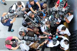 Lewis Hamilton (GBR) Mercedes AMG F1 with the media. 06.11.2014. Formula 1 World Championship, Rd 18, Brazilian Grand Prix, Sao Paulo, Brazil, Preparation Day.