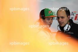 (L to R): Sergio Perez (MEX) Sahara Force India F1 with Gianpiero Lambiase (ITA) Sahara Force India F1 Engineer. 18.04.2014. Formula 1 World Championship, Rd 4, Chinese Grand Prix, Shanghai, China, Practice Day.