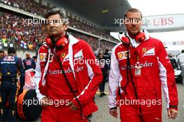 (L to R): Marco Mattiacci (ITA) Ferrari Team Principal with Renato Bisignani (ITA) Ferrari Head of Communications. 20.04.2014. Formula 1 World Championship, Rd 4, Chinese Grand Prix, Shanghai, China, Race Day.