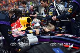 Sebastian Vettel (GER) Red Bull Racing RB10 on the grid. 20.04.2014. Formula 1 World Championship, Rd 4, Chinese Grand Prix, Shanghai, China, Race Day.