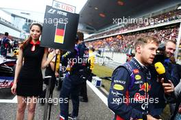 Sebastian Vettel (GER) Red Bull Racing on the grid. 20.04.2014. Formula 1 World Championship, Rd 4, Chinese Grand Prix, Shanghai, China, Race Day.
