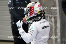 Race winner Lewis Hamilton (GBR) Mercedes AMG F1 celebrates in parc ferme. 20.04.2014. Formula 1 World Championship, Rd 4, Chinese Grand Prix, Shanghai, China, Race Day.