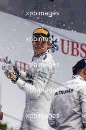 Nico Rosberg (GER) Mercedes AMG F1 W05 celebrates his second position on the podium. 20.04.2014. Formula 1 World Championship, Rd 4, Chinese Grand Prix, Shanghai, China, Race Day.