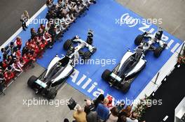 Race winner Lewis Hamilton (GBR) Mercedes AMG F1 W05 and team mate Nico Rosberg (GER) Mercedes AMG F1 W05 celebrate in parc ferme. 20.04.2014. Formula 1 World Championship, Rd 4, Chinese Grand Prix, Shanghai, China, Race Day.