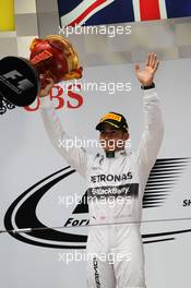 Race winner Lewis Hamilton (GBR) Mercedes AMG F1 celebrates on the podium. 20.04.2014. Formula 1 World Championship, Rd 4, Chinese Grand Prix, Shanghai, China, Race Day.