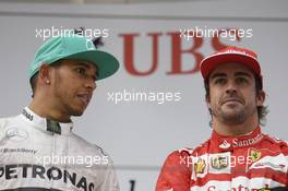 The podium (L to R): Race winner Lewis Hamilton (GBR) Mercedes AMG F1 with Fernando Alonso (ESP) Ferrari. 20.04.2014. Formula 1 World Championship, Rd 4, Chinese Grand Prix, Shanghai, China, Race Day.