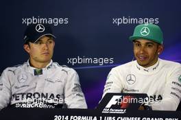 (L to R): Nico Rosberg (GER) Mercedes AMG F1 with team mate Lewis Hamilton (GBR) Mercedes AMG F1 in the FIA Press Conference. 20.04.2014. Formula 1 World Championship, Rd 4, Chinese Grand Prix, Shanghai, China, Race Day.